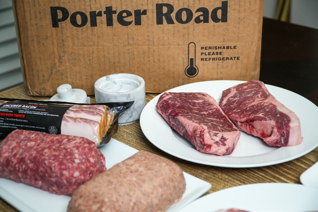 a selection of meats from Porter Road on white plates
