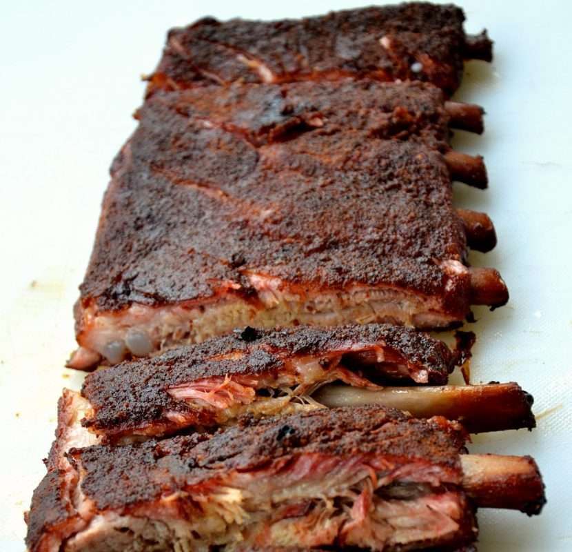 Pellet grill spare ribs on a cutting board