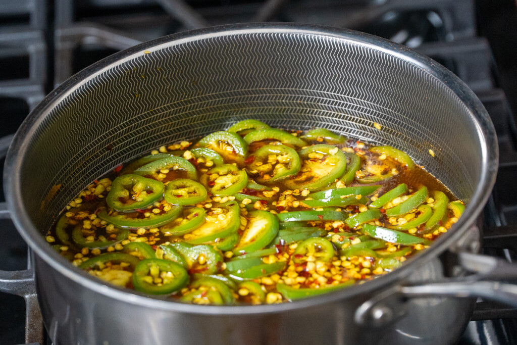 jalapenos in a pot of liquid