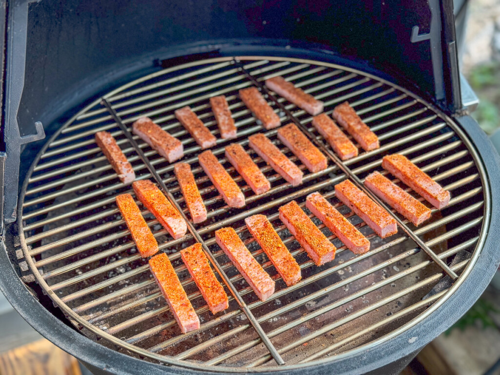 smoked spam fries on the grill at the start of smoking