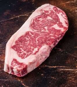 Raw new york strip steak