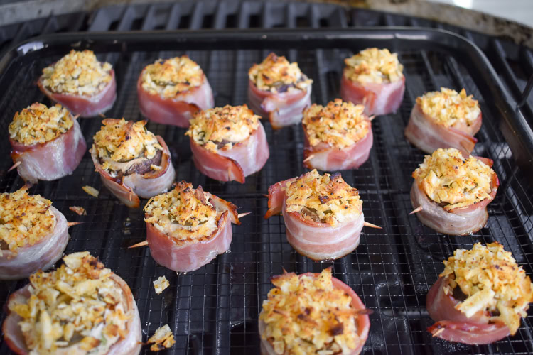 cooked mushroom jalapeno poppers on the grill