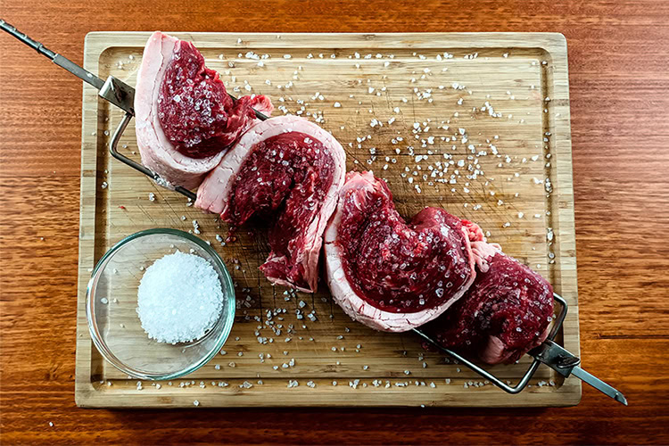 picanha steaks seasoned with kosher salt