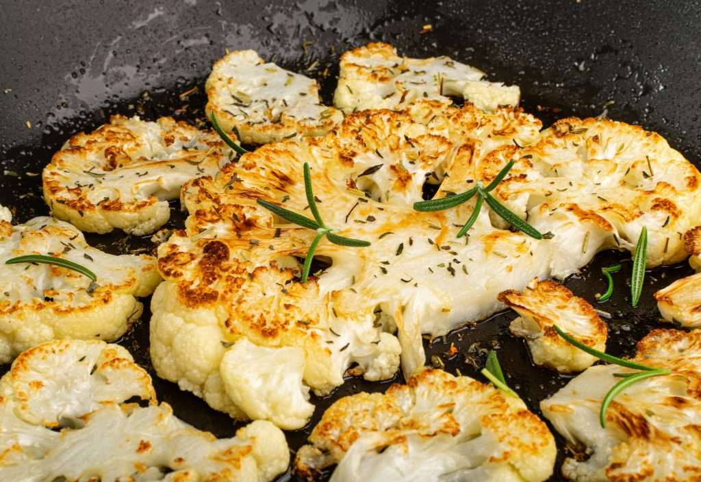 cauliflower steaks with rosemary and garlic