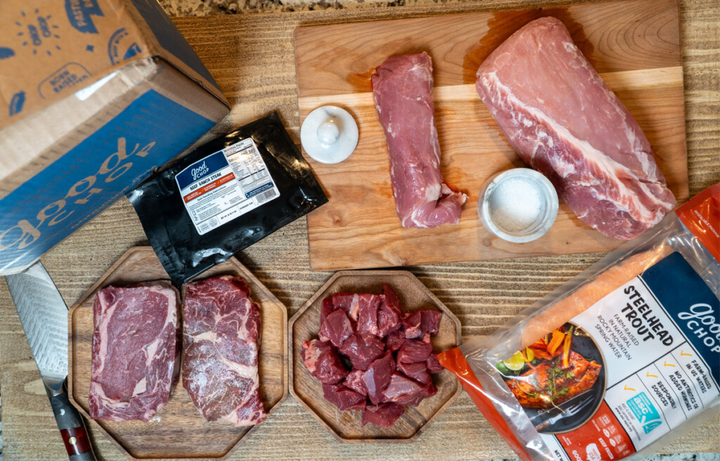 assortment of raw meat from good chop assembled on table