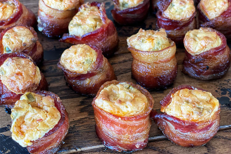 smoked pig shots at the end of cook time on a wooden board