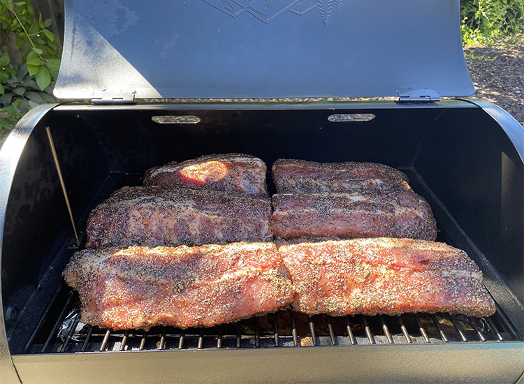 smoking pork ribs on traeger tailgater