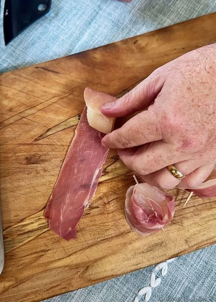 Rolling Scallops in Prosciutto