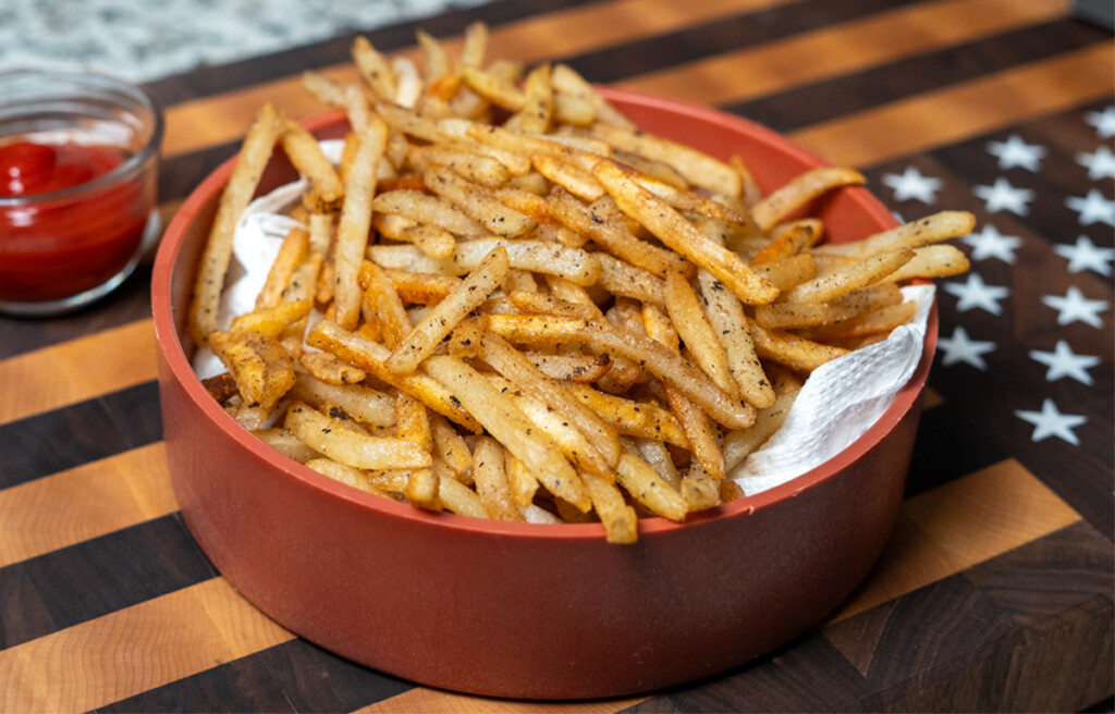 French fires in a brown bowl