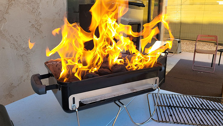 burning coals on the weber go-anywhere