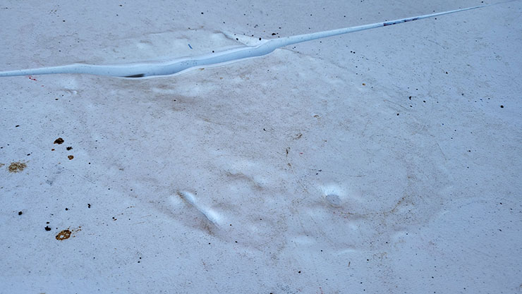 a melted spot on a plastic table