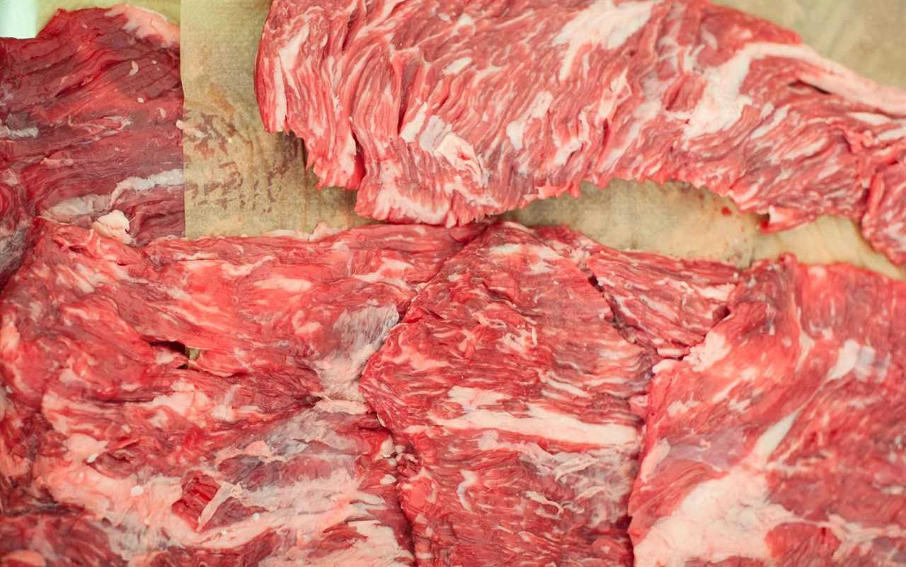 raw skirt steak on a cutting board