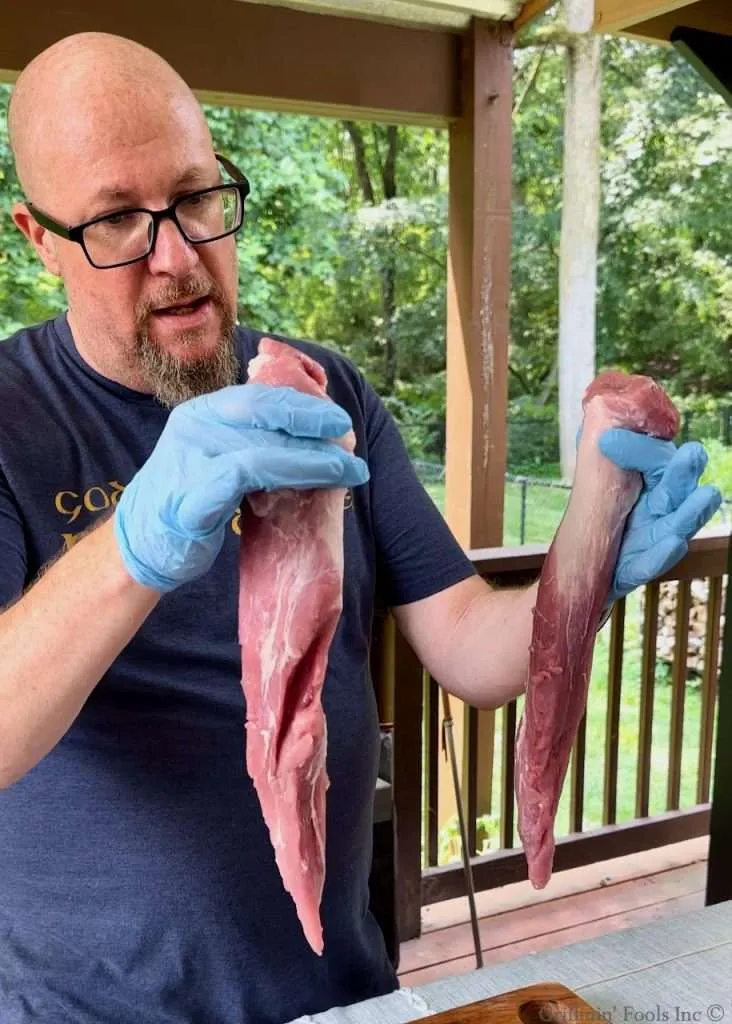 Scott Thomas holding Pork Tenderloins