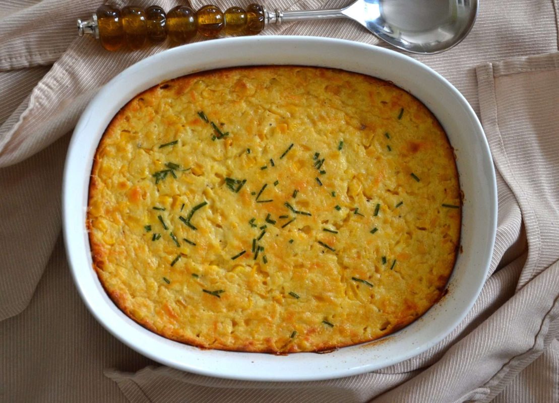 cheddar-chive-corn-pudding-in-white-dish