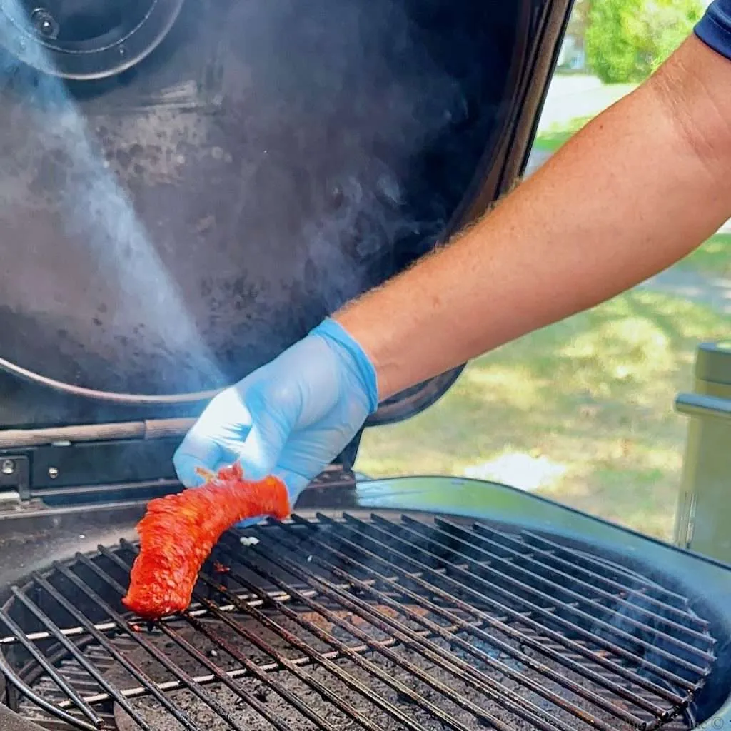 Placing Party Ribs on the Grill with Sunbeam