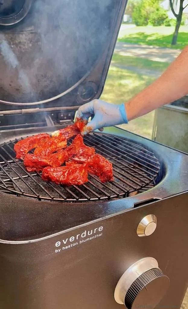 Placing Party Ribs on the Grill with Sunbeam