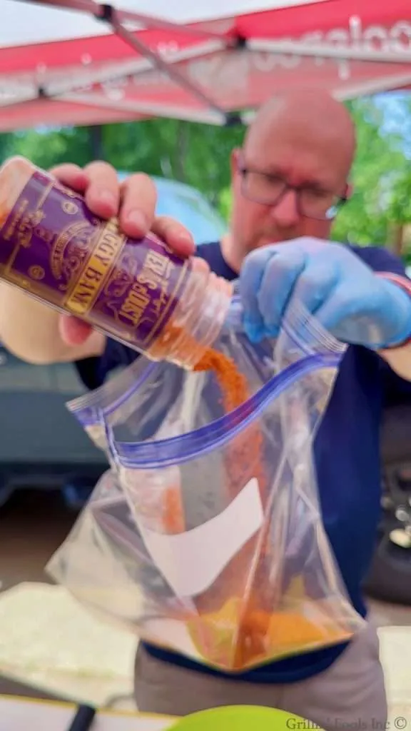 Pouring Seasoning into a Plastic Bag