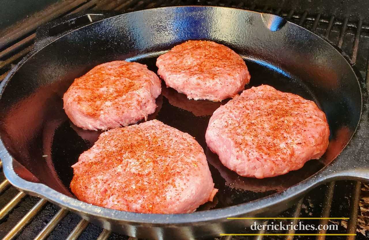 Turkey burgers in a cast iron skillet