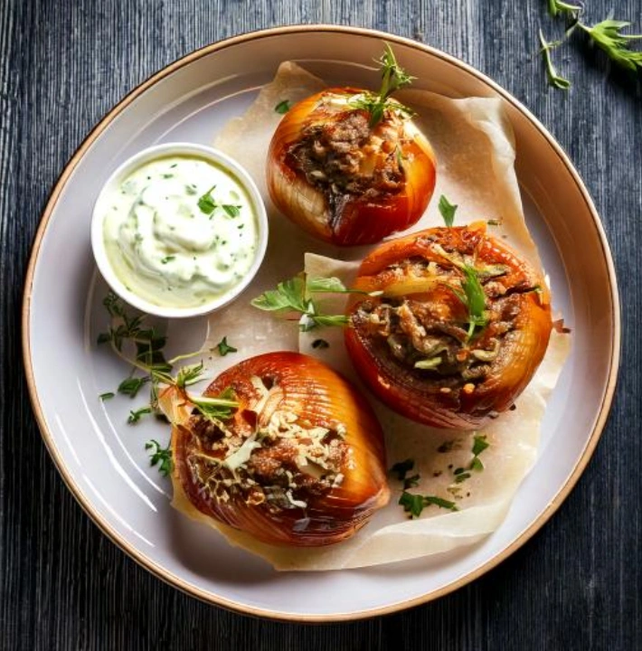 Greek Beef Stuffed Onions with Tzatziki Sauce