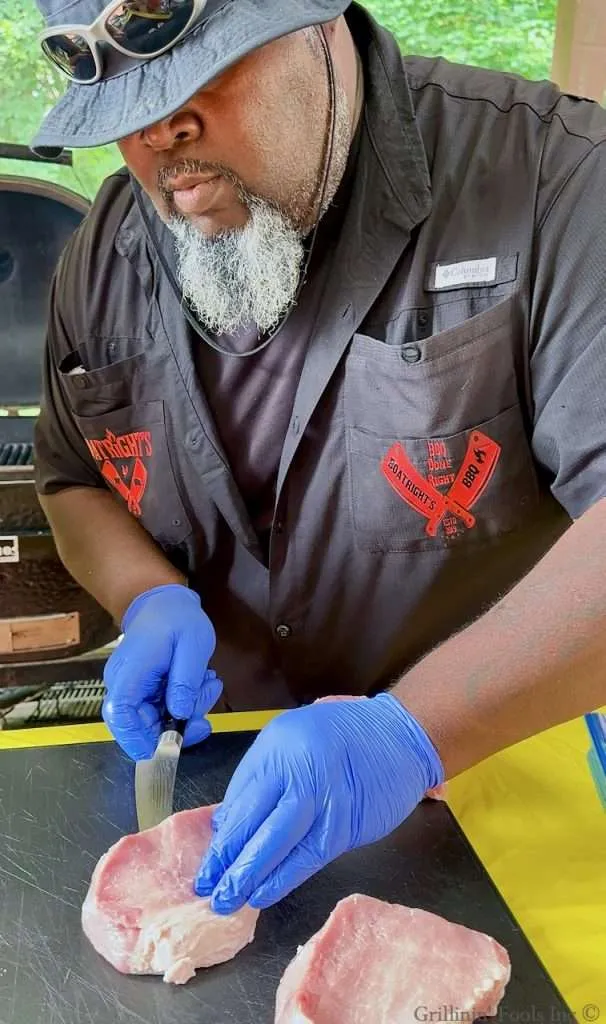 James Boatright cutting pockets in pork chops