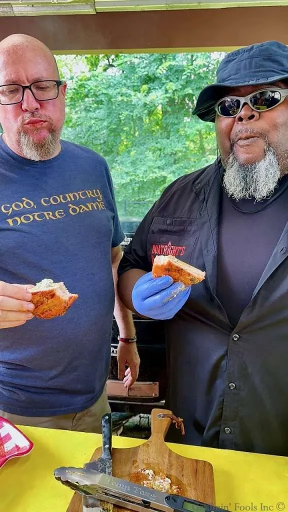 Scott Thomas and James Boatright eating Grilled Stuffed Pork Chops