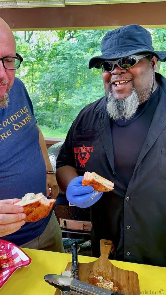 Scott Thomas and James Boatright eating Grilled Stuffed Pork Chops