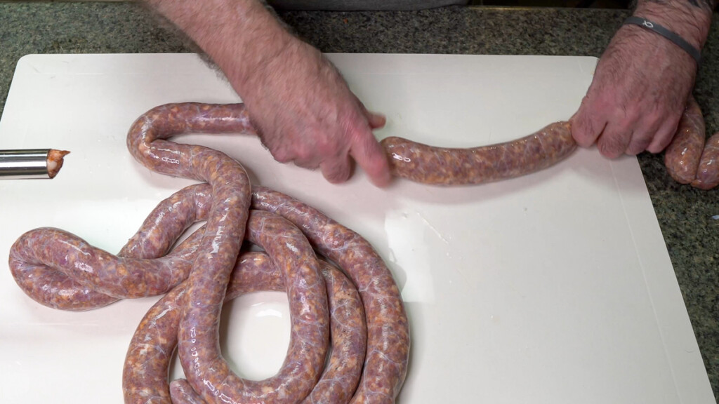 twisting casing to make individual sausage