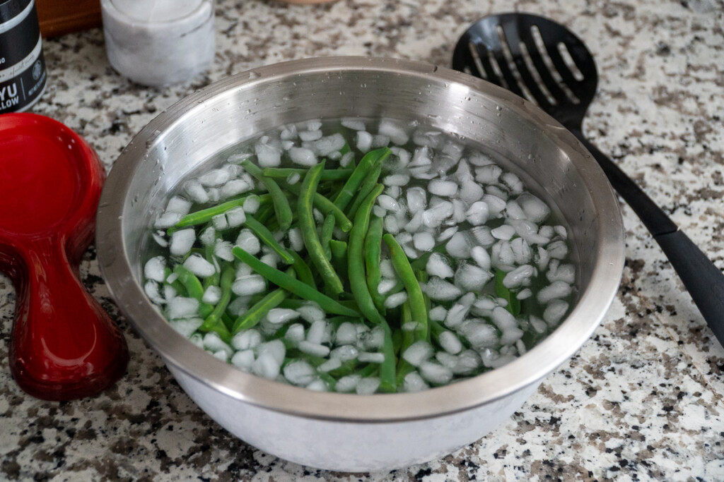 green beans in an ice bath