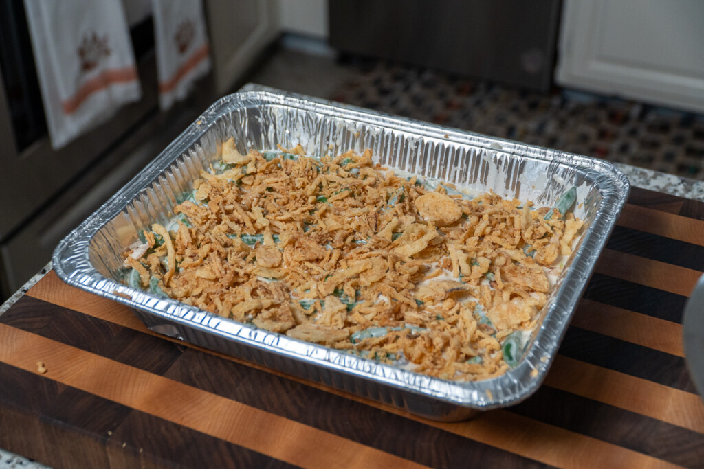 green bean casserole in aluminum tray