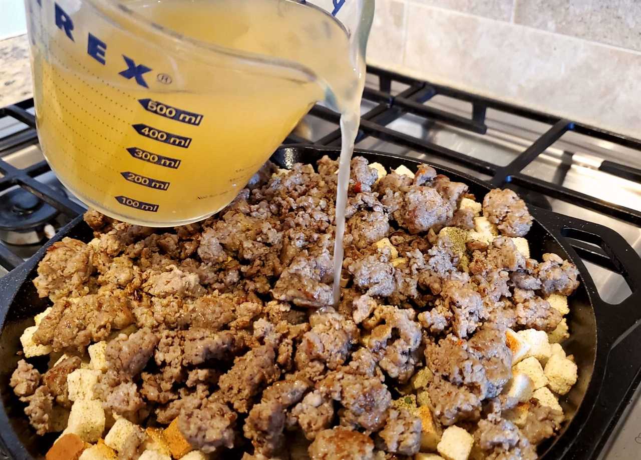 Pouring broth over stuffing ingredients