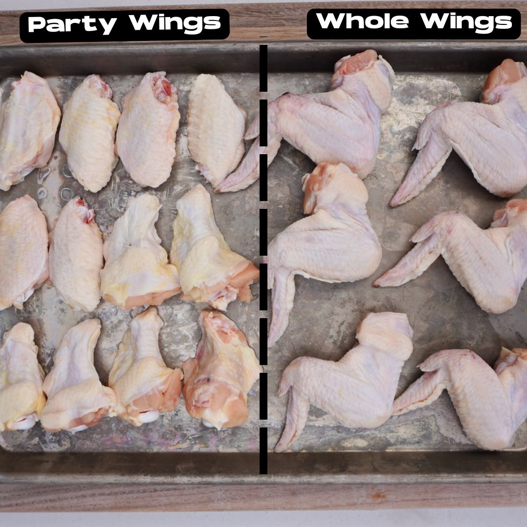 Tray with raw party wings on the left and whole wings on the right.