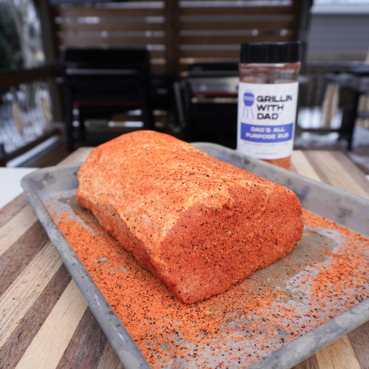 Raw pork loin seasoned with an all purpose rub.