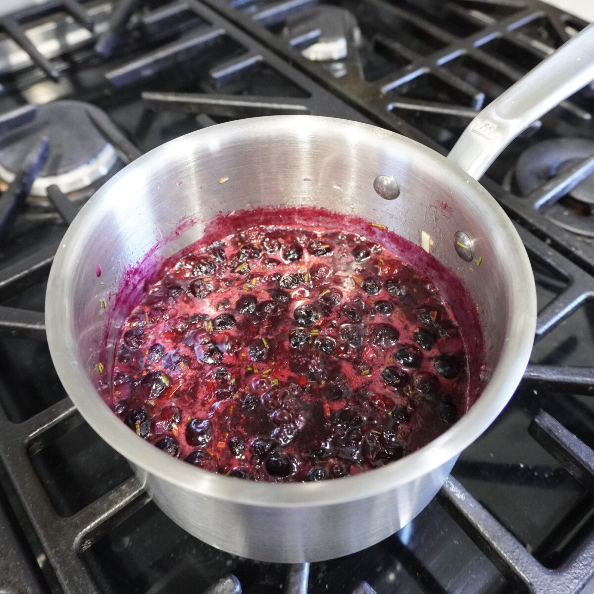 homemade blueberry sauce in saucepan.