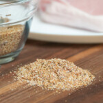 easy pork chop seasoning on a wooden chopping board