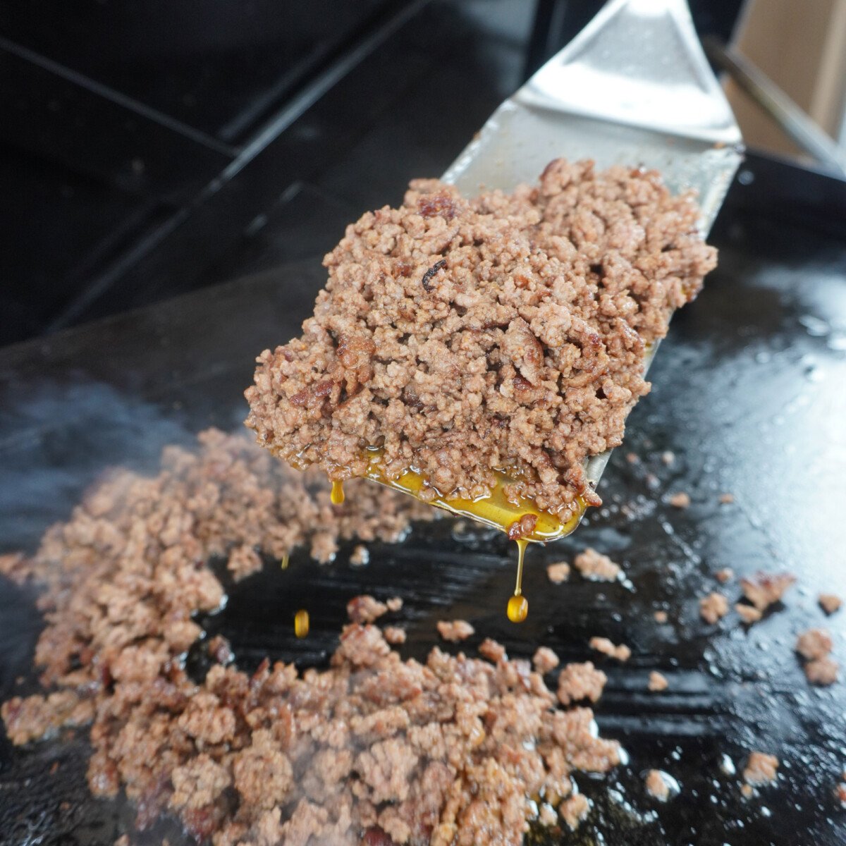 Cooked ground beef.