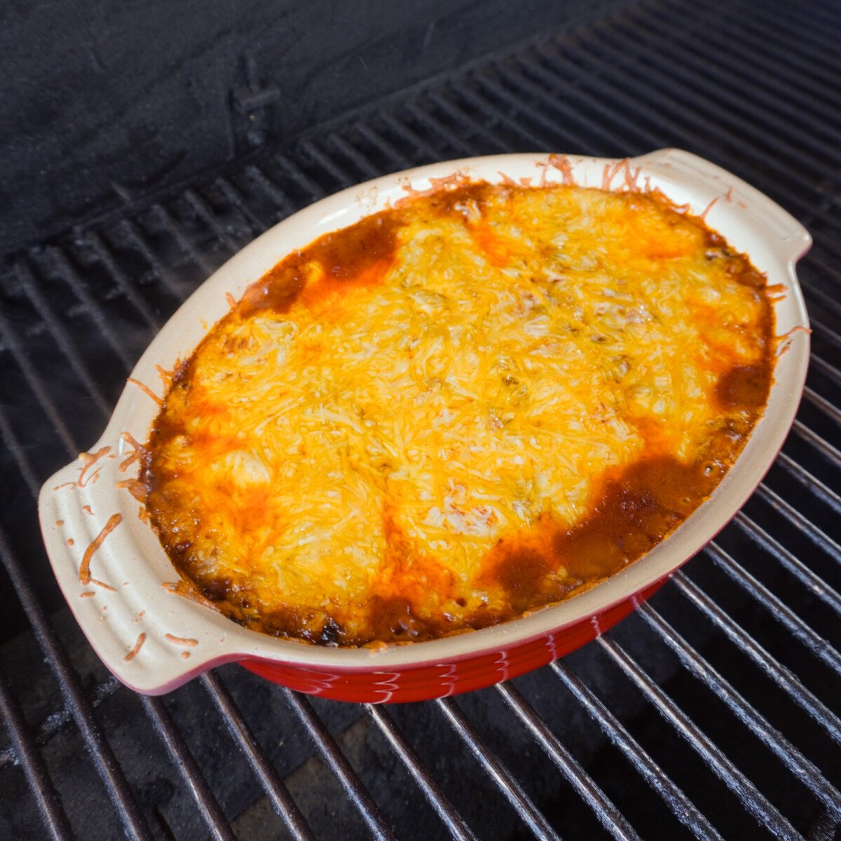 smoked beef enchilada casserole on the grill.