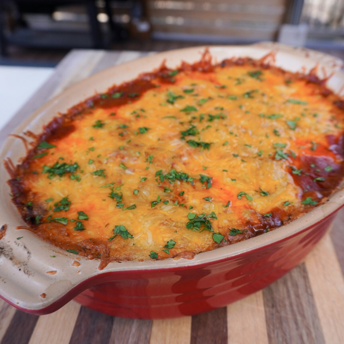 smoked beef enchilada casserole dressed with chopped cilantro.