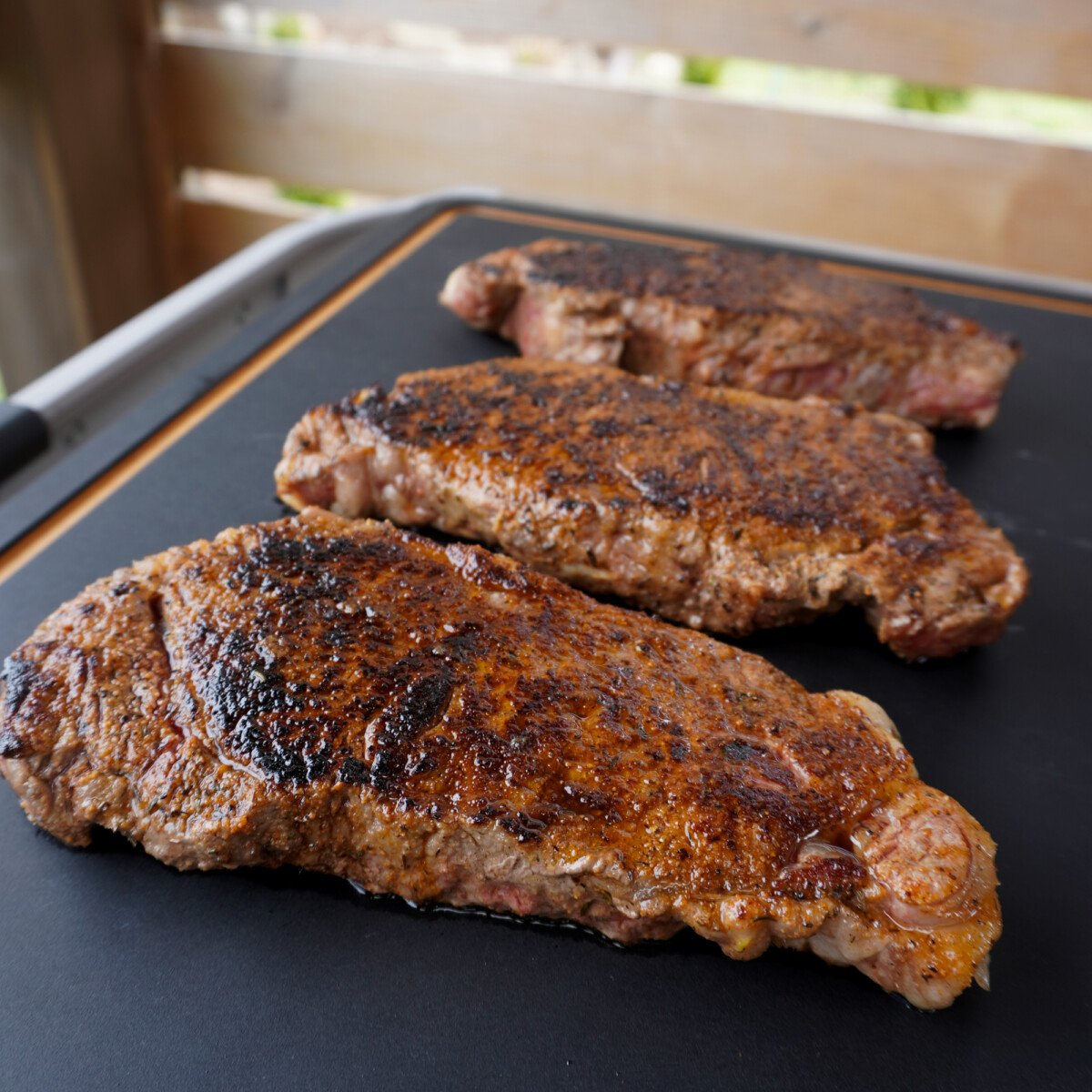Grilled steaks resting.