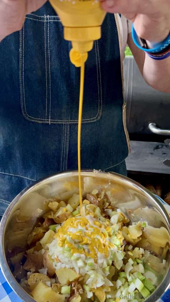 Adding Mustard to Potato Salad