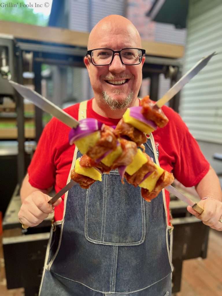 The Grillin' Fool acting the Fool with Sword Skewers
