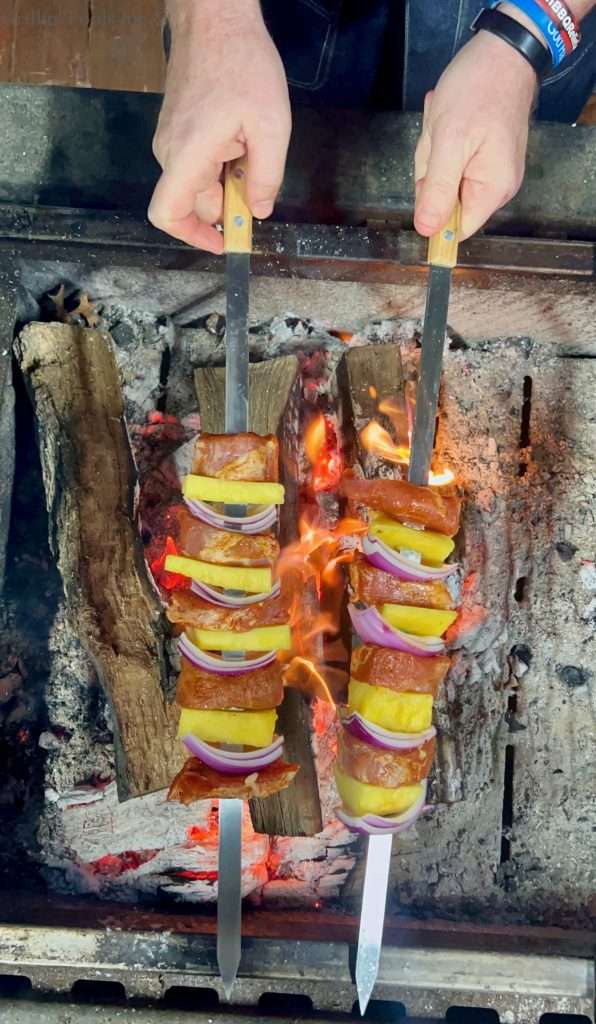 Pork Skewers going over Live Fire