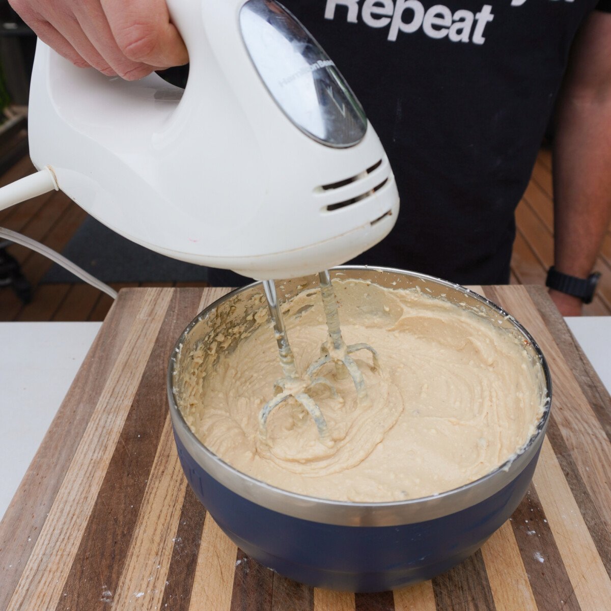 mixing maple bourbon dip ingredients.