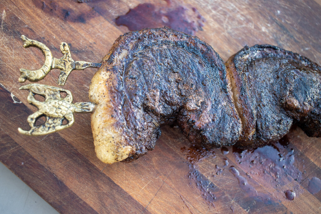 a well cooked piece of brazilian-style picanha steak