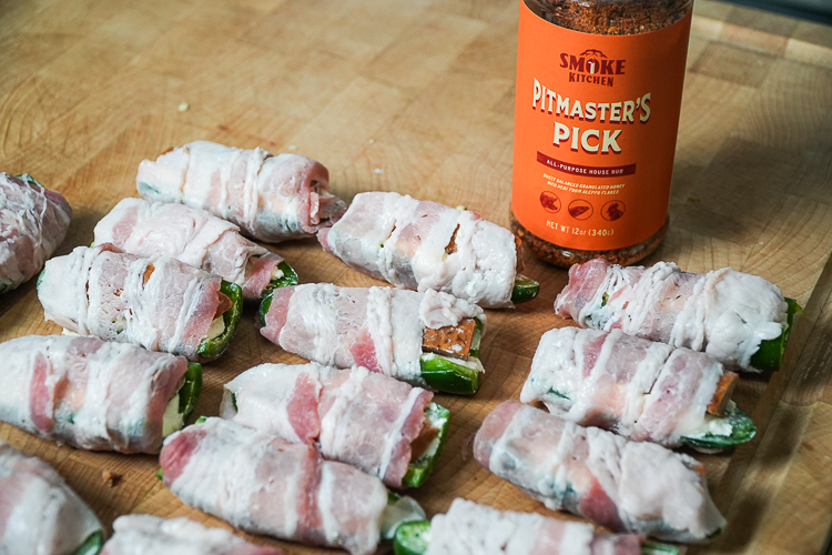a rack full of bacon wrapped jalapeños