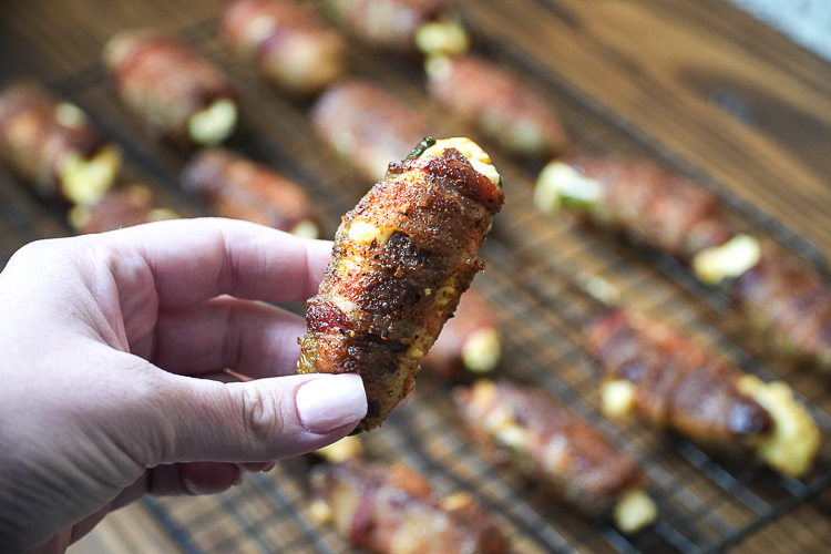 a atomic buffalo turd being held in the air