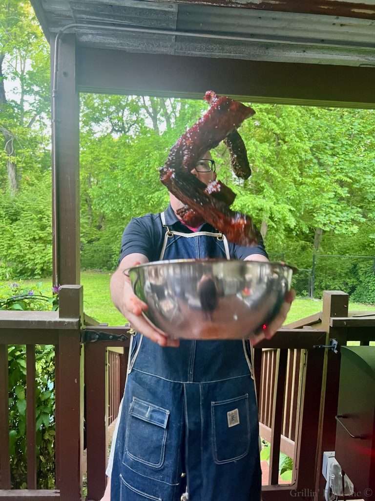Action shot of tossing ribs