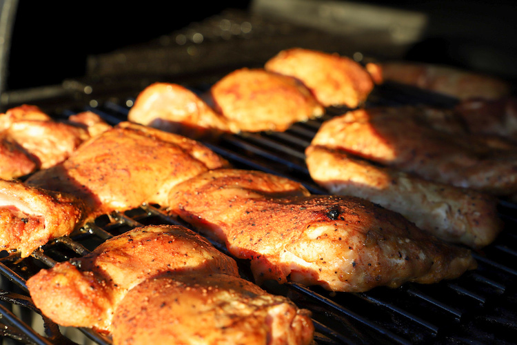chicken thighs in a smoker