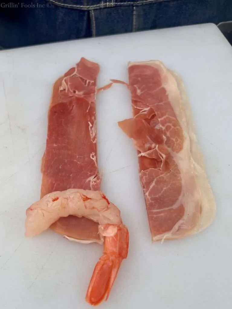 Roll up each Shrimp in Proscutto