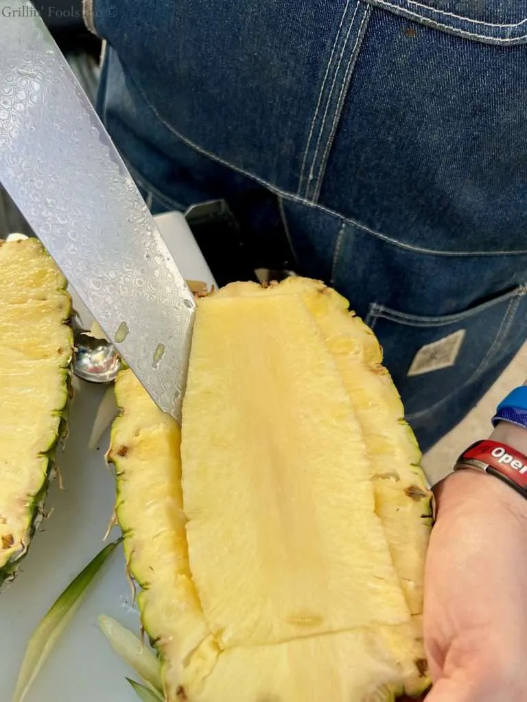 Carving out the interior of the Pineapple