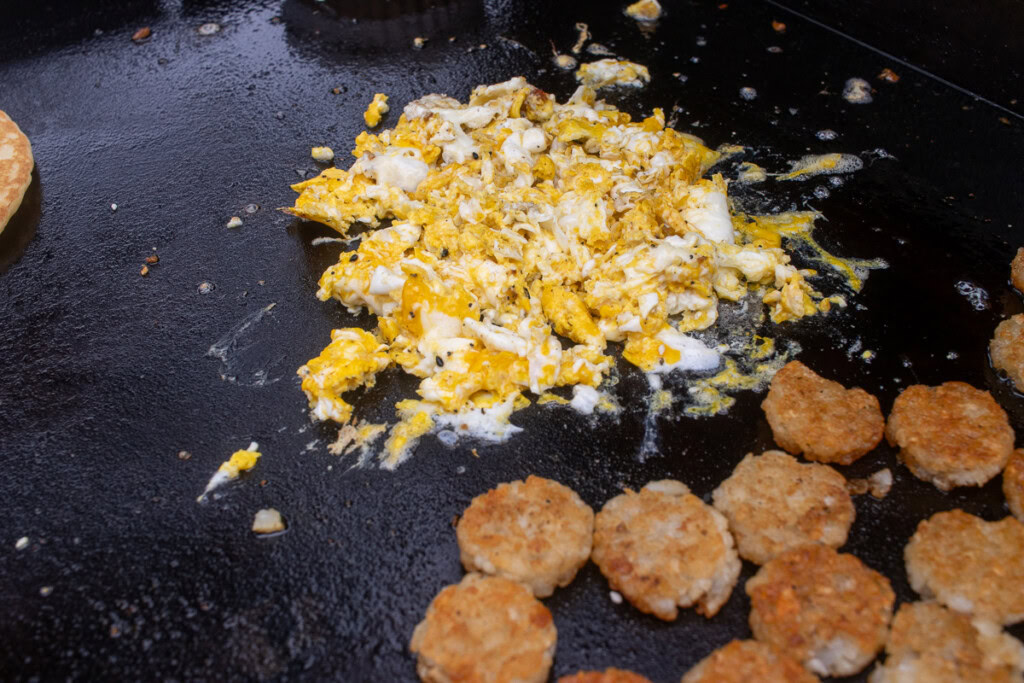 scrambled eggs on the griddle